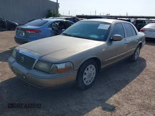 2004 Mercury Grand Marquis GS z VIN 2MEFM74WX4X643435, wystawiony jako IAAI lot #41932119 z przebiegiem 274 468 mil mil oraz . Historia ofert i sprzedaży dostępna na DreamBid. Obrazek 2.