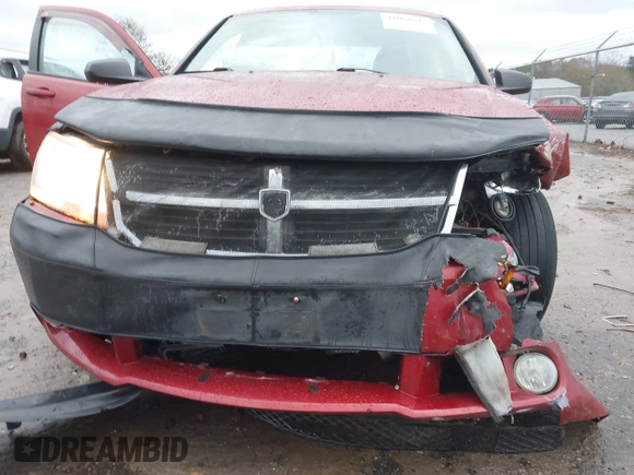 2009 Dodge Avenger SXT with VIN 1B3LC56BX9N523621, listed as a IAAI auction lot 41068673 with 174,055 mi miles. Bid and sale history available at carsss.com. Image 12.