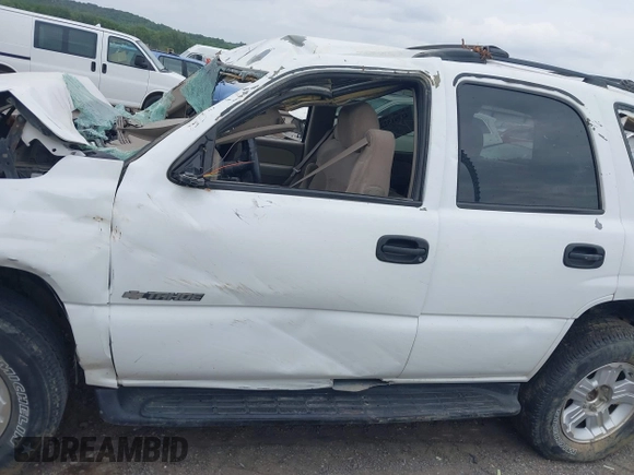 2002 Chevrolet Tahoe LT with VIN 1GNEC13Z52J341962, listed as a IAAI auction lot 42391522 with 239,452 mi miles and . Bid and sale history available at DreamBid. Image 14.