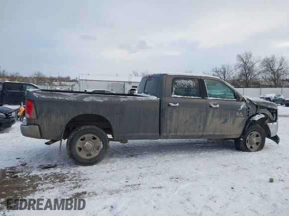 2014 Ram 2500 SLT with VIN 3C6TR5JT5EG203839, listed as a IAAI auction lot 41277795 with 135,344 mi miles and . Bid and sale history available at DreamBid. Image 13.