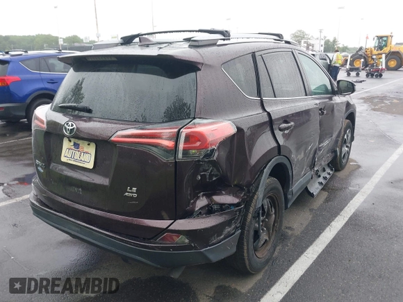 2018 Toyota RAV4 LE with VIN 2T3BFREV9JW857284, listed as a IAAI auction lot 42448480 with 85,551 mi miles and . Bid and sale history available at DreamBid. Image 4.