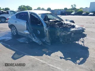 2015 Infiniti Q50 Premium with VIN JN1BV7AR6FM409639, listed as a IAAI auction lot 42527040 with Not provided miles and . Bid and sale history available at DreamBid. Image 1.