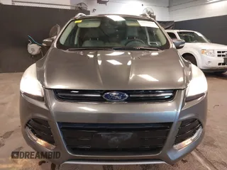 2014 Ford Escape Titanium with VIN 1FMCU9JX0EUE45254, listed as a IAAI auction lot 42038700 with 60,103 mi miles. Bid and sale history available at carsss.com. Image 12.
