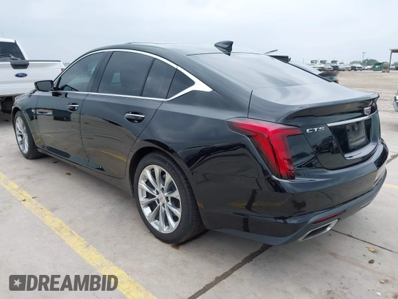 2023 Cadillac CT5 Premium Luxury z VIN 1G6DN5RK7P0119990, wystawiony jako IAAI lot #42293014 z przebiegiem 44 690 mil mil oraz . Historia ofert i sprzedaży dostępna na DreamBid. Obrazek 3.
