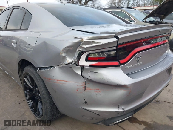 2015 Dodge Charger SXT with VIN 2C3CDXHG4FH884058, listed as a IAAI auction lot 41724894 with 202,701 mi miles and . Bid and sale history available at DreamBid. Image 18.
