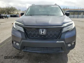 2020 Honda Passport Touring z VIN 5FNYF8H9XLB007336, wystawiony jako Copart lot #51012975 z przebiegiem 74 620 mil mil oraz Szkoda całkowita • Salvage title. Historia ofert i sprzedaży dostępna na DreamBid. Obrazek 5.