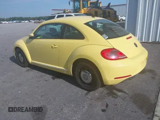 2013 Volkswagen Beetle 2.5L with VIN 3VWHX7AT7DM613197, listed as a IAAI auction lot 41298890 with 130,219 mi miles and . Bid and sale history available at DreamBid. Image 3.