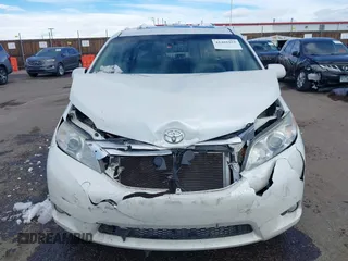 2011 Toyota Sienna XLE AAS with VIN 5TDYK3DC8BS045352, listed as a IAAI auction lot 41401955 with 142,492 mi miles and . Bid and sale history available at DreamBid. Image 12.