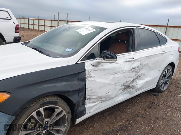2019 Ford Fusion Titanium with VIN 3FA6P0D93KR138574, listed as a IAAI auction lot 41967094 with 118,297 mi miles. Bid and sale history available at carsss.com. Image 6.