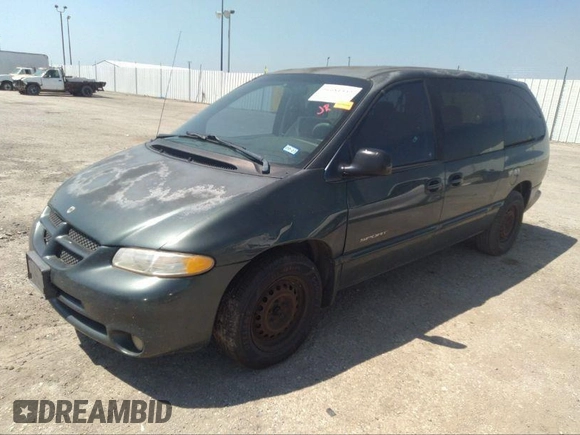2000 Dodge Caravan SE with VIN 2B4GP44G9YR629814, listed as a IAAI auction lot 37525321 with Not provided miles and . Bid and sale history available at DreamBid. Image 2.