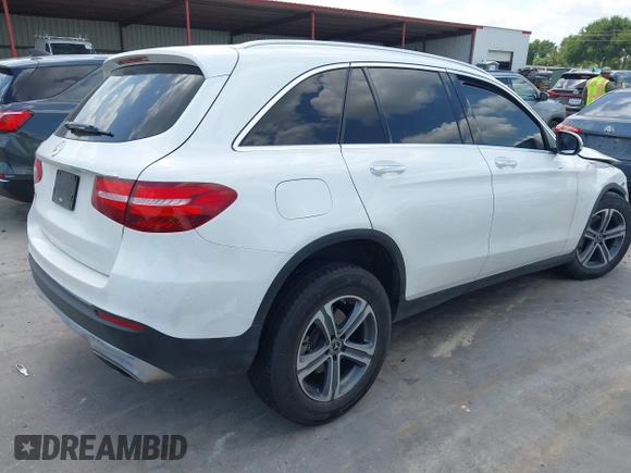 2019 Mercedes-Benz GLC 300 with VIN WDC0G4JB3K1000679, listed as a IAAI auction lot 42221925 with 91,005 mi miles and . Bid and sale history available at DreamBid. Image 4.