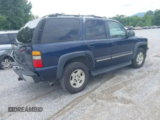 2005 Chevrolet Tahoe LT with VIN 1GNEK13T15J169979, listed as a IAAI auction lot 42718037 with 241,404 mi miles and . Bid and sale history available at DreamBid. Image 4.