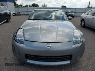 2005 Nissan 350Z with VIN JN1AZ34D65M610383, listed as a Copart auction lot 63184204 with 66,806 mi miles and Salvage Title. Bid and sale history available at DreamBid. Image 5.