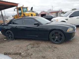 2013 Dodge Charger SXT with VIN 2C3CDXHG2DH558465, listed as a IAAI auction lot 41563714 with 151,052 mi miles. Bid and sale history available at carsss.com. Image 13.