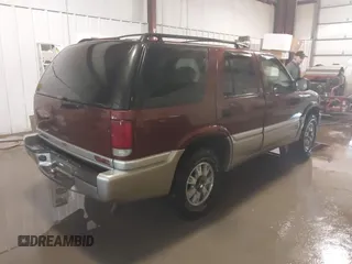 2001 GMC Jimmy SLE with VIN 1GKDT13W712195040, listed as a IAAI auction lot 41710729 with 189,584 mi miles. Bid and sale history available at carsss.com. Image 4.