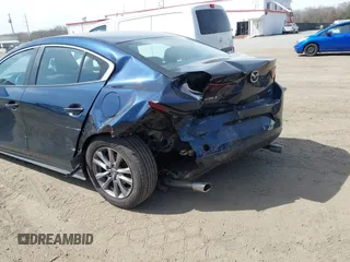 2021 Mazda 3 S with VIN 3MZBPAAL2MM253405, listed as a IAAI auction lot 41836752 with 63 mi miles and . Bid and sale history available at DreamBid. Image 6.