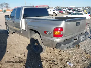 2003 Chevrolet Silverado 1500 with VIN 2GCEK19T531118735, listed as a IAAI auction lot 41706782 with 166,047 mi miles. Bid and sale history available at carsss.com. Image 3.