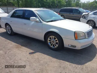 2004 Cadillac DeVille z VIN 1G6KD54Y04U156194, wystawiony jako IAAI lot #42143148 z przebiegiem 141 938 mil mil oraz . Historia ofert i sprzedaży dostępna na DreamBid. Obrazek 1.