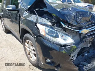 2020 Chevrolet Traverse LT Cloth z VIN 1GNEVGKW6LJ101101, wystawiony jako IAAI lot #40050482 z przebiegiem 86 527 mil mil oraz . Historia ofert i sprzedaży dostępna na DreamBid. Obrazek 18.