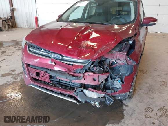 2014 Ford Escape Titanium with VIN 1FMCU0JX6EUC58726, listed as a IAAI auction lot 41656779 with 162,888 mi miles. Bid and sale history available at carsss.com. Image 6.