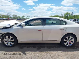 2012 Buick LaCrosse Premium 1 z VIN 1G4GD5E34CF130301, wystawiony jako IAAI lot #42205574 z przebiegiem 117 941 mil mil oraz . Historia ofert i sprzedaży dostępna na DreamBid. Obrazek 15.