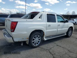 2003 Cadillac Escalade EXT z VIN 3GYEK63N43G144901, wystawiony jako Copart lot #50575195 z przebiegiem 236 328 mil mil oraz Tytuł czysty. Historia ofert i sprzedaży dostępna na DreamBid. Obrazek 3.