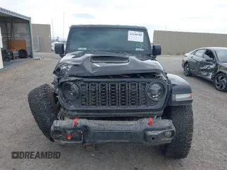 2022 Jeep Wrangler Unlimited Rubicon with VIN 1C4HJXFN2NW134024, listed as a IAAI auction lot 42248188 with 41,899 mi miles and . Bid and sale history available at DreamBid. Image 12.