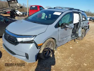 2023 Honda Odyssey Touring with VIN 5FNRL6H84PB005208, listed as a IAAI auction lot 41374452 with 60,288 mi miles and . Bid and sale history available at DreamBid. Image 2.