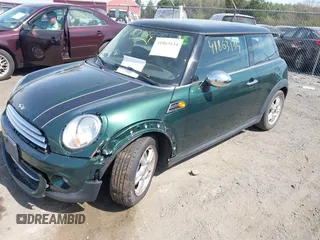 2011 MINI Hardtop with VIN WMWSU3C51BT183574, listed as a IAAI auction lot 41863134 with 137,140 mi miles and . Bid and sale history available at DreamBid. Image 2.