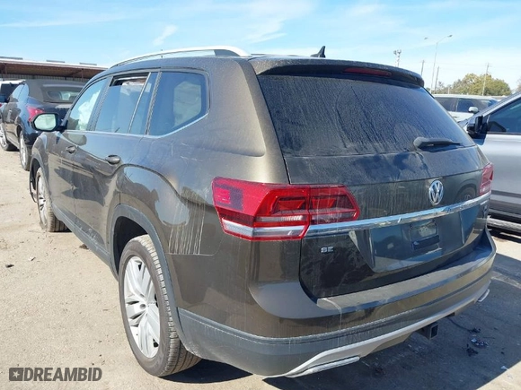 2019 Volkswagen Atlas 3.6L V6 SE w/Technology with VIN 1V2WR2CA0KC572590, listed as a IAAI auction lot 41083846 with 60,232 mi miles. Bid and sale history available at carsss.com. Image 3.