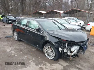 2015 Toyota Avalon Hybrid XLE Touring with VIN 4T1BD1EB1FU041506, listed as a IAAI auction lot 41238124 with 135,256 mi miles. Bid and sale history available at carsss.com. Image 1.