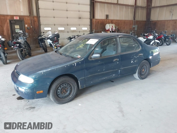 1996 Nissan Altima XE with VIN 1N4BU31D4TC139105, listed as a IAAI auction lot 40241213 with 115,817 mi miles and . Bid and sale history available at DreamBid. Image 2.