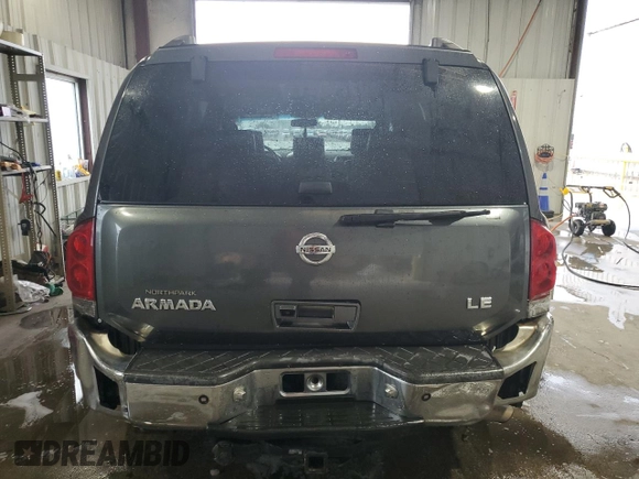 2007 Nissan Armada SE z VIN 5N1BA08A27N700193, wystawiony jako Copart lot #58807975 z przebiegiem 254 318 mil mil oraz Szkoda całkowita • Salvage title. Historia ofert i sprzedaży dostępna na DreamBid. Obrazek 6.