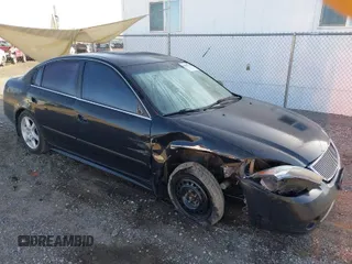 2003 Nissan Altima SE z VIN 1N4BL11DX3C294572, wystawiony jako IAAI lot #41957768 z przebiegiem 141 731 mil mil oraz . Historia ofert i sprzedaży dostępna na DreamBid. Obrazek 1.