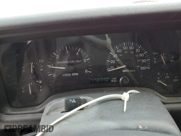 1999 Jeep Cherokee Sport with VIN 1J4FF68S3XL667570, listed as a Copart auction lot 52821105 with 173,712 mi miles and Salvage Title. Bid and sale history available at DreamBid. Image 9.