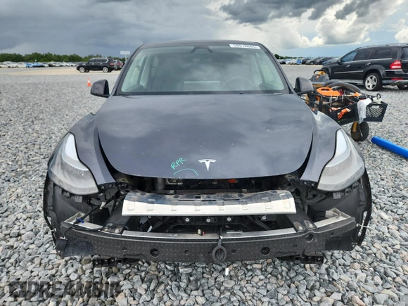 2024 Tesla Model Y Long Range with VIN 7SAYGDEE9RA255688, listed as a Copart auction lot 58918665 with 21,302 mi miles and Salvage title. Bid and sale history available at DreamBid. Image 5.