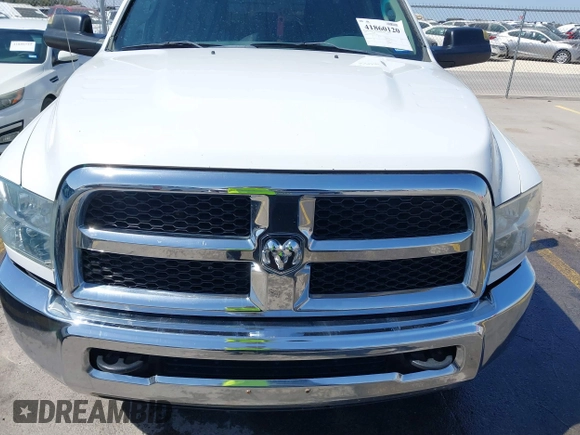 2014 Ram 2500 Tradesman with VIN 3C6TR4CT6EG243306, listed as a IAAI auction lot 41860120 with 101,110 mi miles and . Bid and sale history available at DreamBid. Image 6.