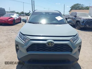 2020 Toyota RAV4 XLE with VIN 2T3W1RFV0LW069849, listed as a IAAI auction lot 42138074 with 112,062 mi miles and . Bid and sale history available at DreamBid. Image 12.