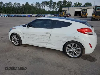 2013 Hyundai Veloster w/Gray Int with VIN KMHTC6ADXDU130886, listed as a Copart auction lot 57478095 with 130,008 mi miles and Salvage title. Bid and sale history available at DreamBid. Image 2.