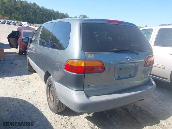 1998 Toyota Sienna CE with VIN 4T3GF19C9WU067779, listed as a IAAI auction lot 42005029 with 202,164 mi miles. Bid and sale history available at carsss.com. Image 3.
