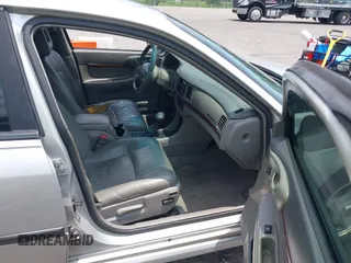 2000 Chevrolet Impala LS z VIN 2G1WH55K3Y9229891, wystawiony jako IAAI lot #42393652 z przebiegiem 183 416 mil mil oraz . Historia ofert i sprzedaży dostępna na DreamBid. Obrazek 5.