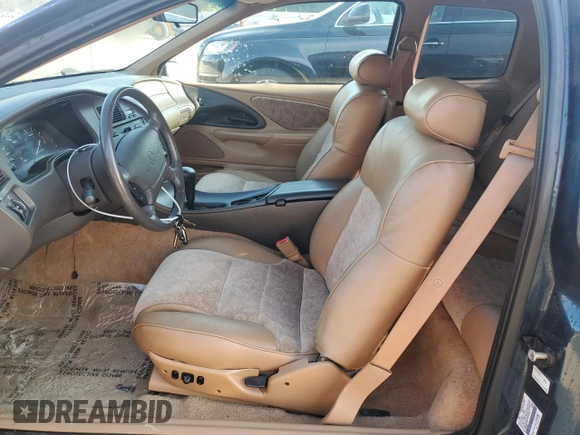 1996 Mercury Cougar z VIN 1MELM62W6TH629420, wystawiony jako Copart lot #67101634 z przebiegiem 71 996 mil mil oraz Szkody całkowita. Historia ofert i sprzedaży dostępna na DreamBid. Obrazek 7.