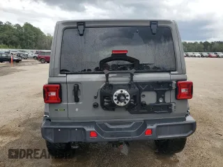 2020 Jeep Wrangler Unlimited Sahara with VIN 1C4HJXEM1LW202755, listed as a Copart auction lot 71248044 with 76,730 mi miles and Salvage Title. Bid and sale history available at carsss.com. Image 6.