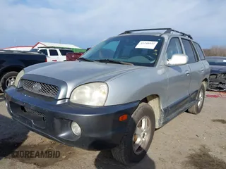 2004 Hyundai Santa Fe GLS with VIN KM8SC13EX4U799955, listed as a IAAI auction lot 41240442 with 281,394 mi miles. Bid and sale history available at carsss.com. Image 2.