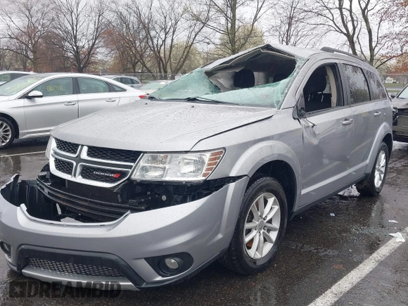 2016 Dodge Journey SXT with VIN 3C4PDDBG7GT173158, listed as a IAAI auction lot 42020182 with 159,136 mi miles. Bid and sale history available at carsss.com. Image 2.