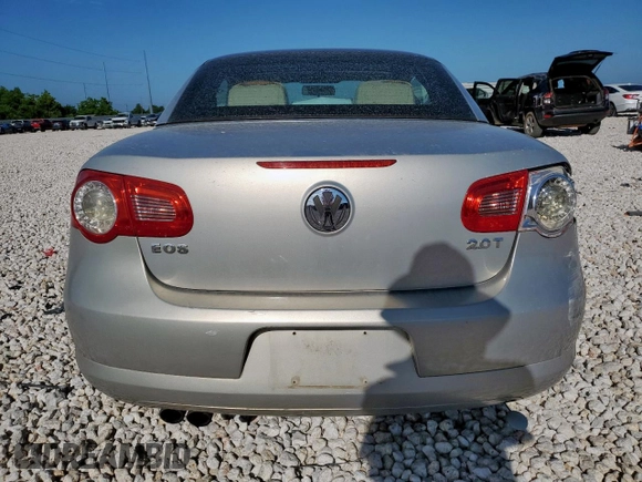 2009 Volkswagen Eos Komfort с VIN WVWAA71F99V016050, выставлен на аукционе Copart как лот 58229565 с пробегом 105 584 миль миль и Списание • Salvage title. История ставок и продаж доступна на DreamBid. Изображение 6.