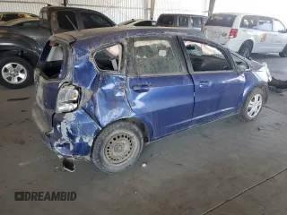 2009 Honda Fit with VIN JHMGE872X9S036722, listed as a Copart auction lot 64701315 with 197,305 mi miles and Non repairable. Bid and sale history available at DreamBid. Image 3.