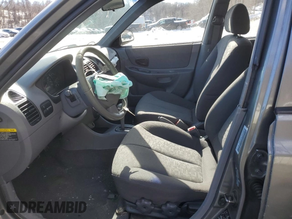 2003 Hyundai Accent GL with VIN KMHCG45C33U469496, listed as a Copart auction lot 45926595 with 77,737 mi miles and Salvage Title. Bid and sale history available at carsss.com. Image 7.