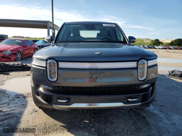 2022 Rivian R1T Adventure Package with VIN 7FCTGAAA6NN013037, listed as a Copart auction lot 75548964 with 8,877 mi miles and Salvage Title. Bid and sale history available at carsss.com. Image 5.
