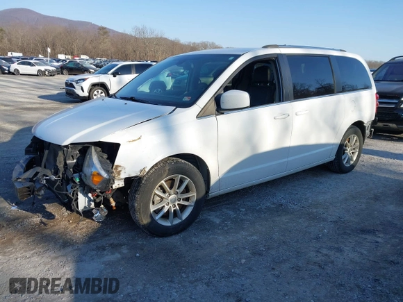 2019 Dodge Grand Caravan SXT with VIN 2C4RDGCG2KR775177, listed as a IAAI auction lot 41363146 with 129,739 mi miles and . Bid and sale history available at DreamBid. Image 18.
